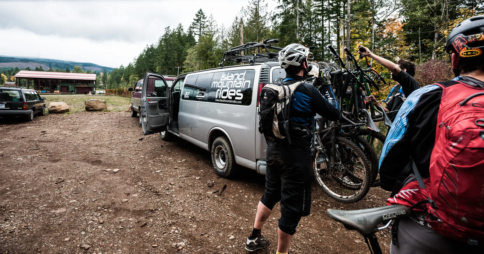 Riders loading mountain bikes onto a shuttle van at Forbidden Plateau